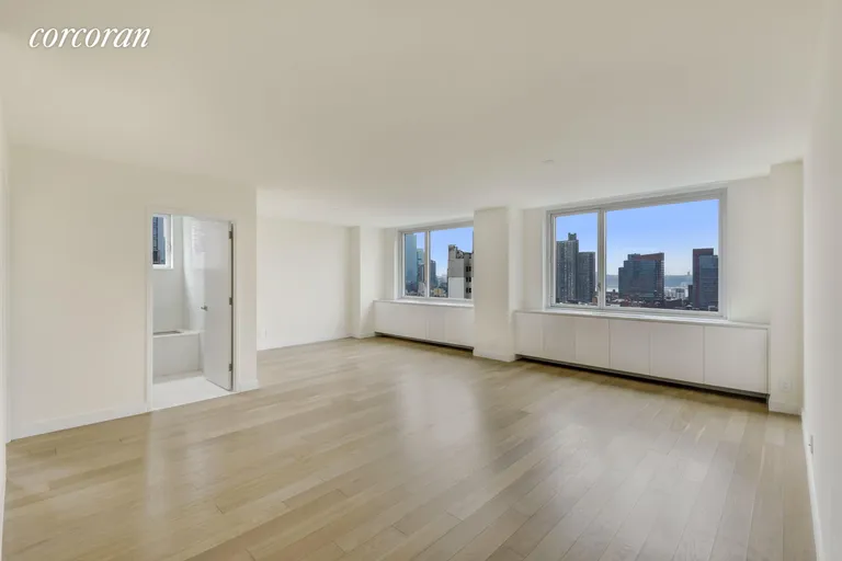 New York City Real Estate | View 301 West 53rd Street, 15A | Living Room (West Exposure) | View 2