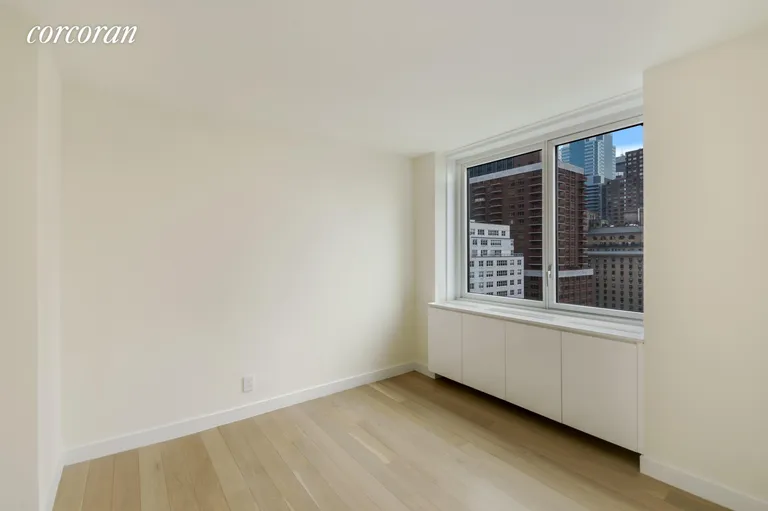 New York City Real Estate | View 301 West 53rd Street, 15A | Second Bedroom (South Exposure) | View 8