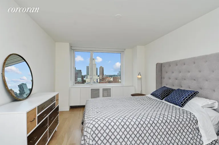 New York City Real Estate | View 301 West 53rd Street, 15A | Furnished Master Bedroom (West Exposure) | View 4