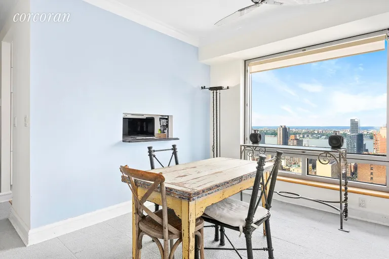 New York City Real Estate | View 301 West 57th Street, 29A | Dining Area with River Views | View 2