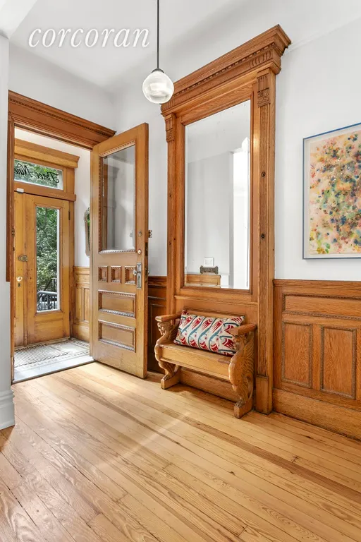 New York City Real Estate | View 393 Sterling Place | Welcoming entry foyer with large coat closet | View 2