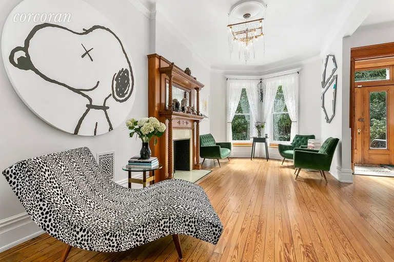 New York City Real Estate | View 393 Sterling Place | Bright and airy sitting room in the front parlor | View 4