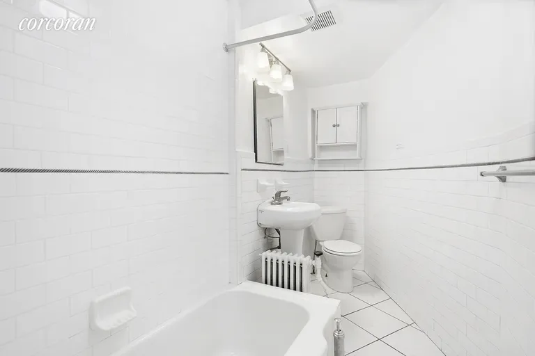 New York City Real Estate | View 384 Park Place, 1 | Updated modern bath with subway tile throughout | View 5