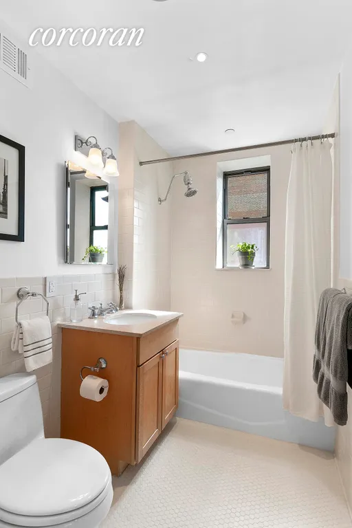 New York City Real Estate | View 69 East 130th Street, 4C | Windowed master bathroom | View 4