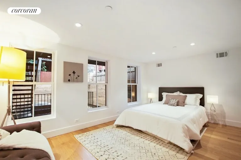 New York City Real Estate | View 23 North Elliott Place, 1 | Quiet master bedroom has three windows + 2 closets | View 3