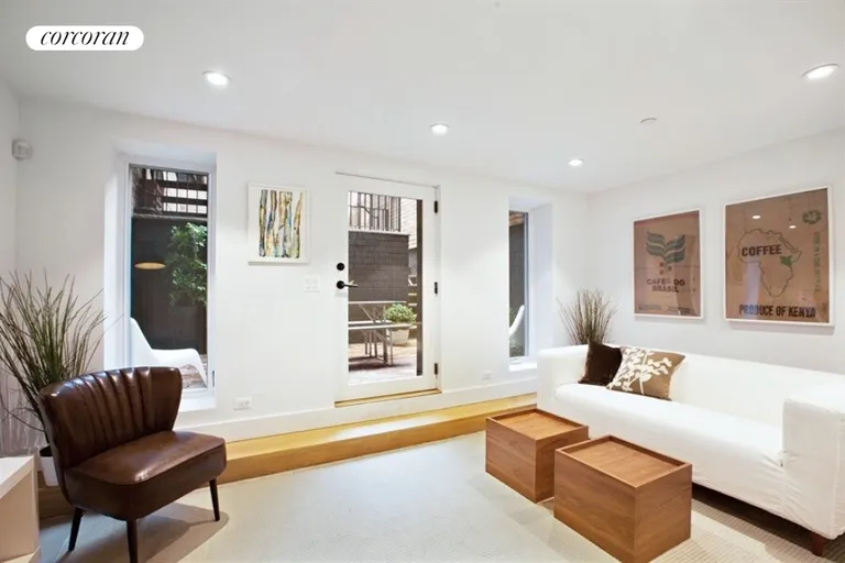 New York City Real Estate | View 23 North Elliott Place, 1 | Recreation room leads to the private rear yard | View 5