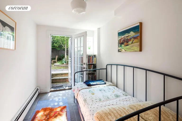 New York City Real Estate | View 114 Gates Avenue, 1 | Smallest Bedroom gives access to the Garden | View 10