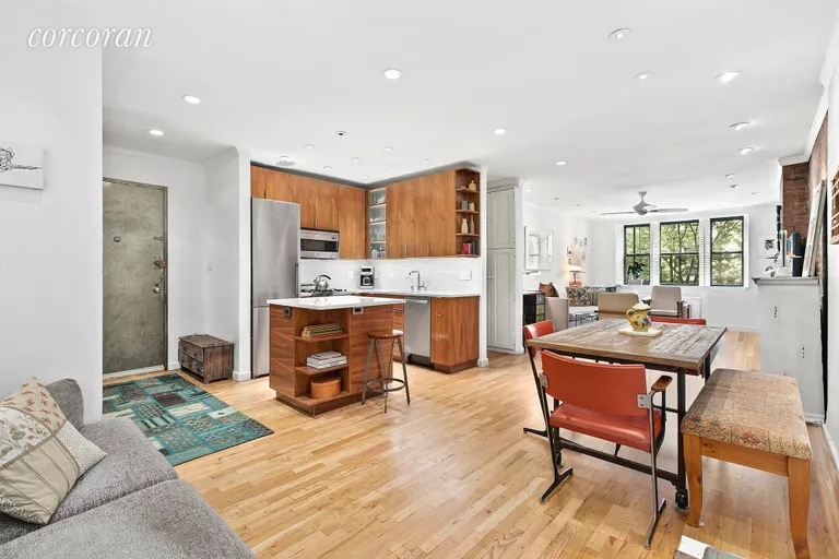 New York City Real Estate | View 250 West 15th Street, 2C | Gut renovated kitchen w loads of room for dining | View 4