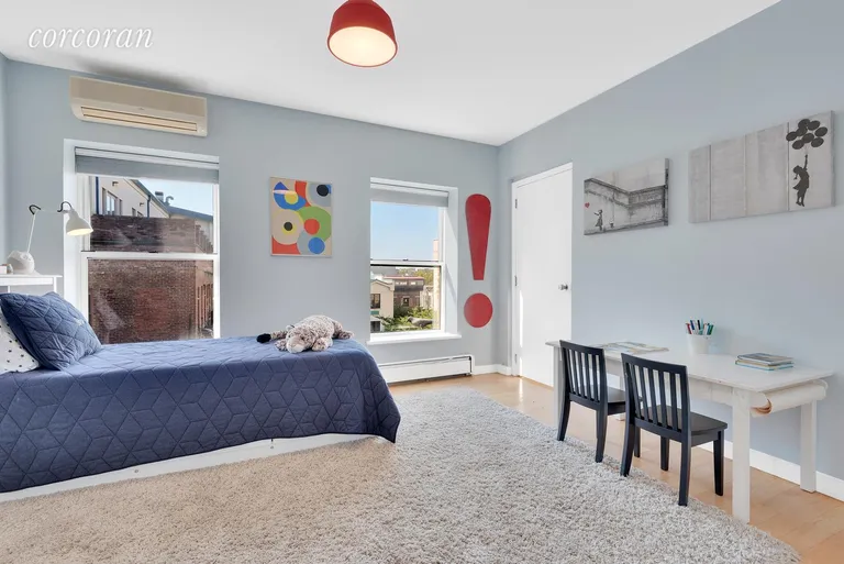 New York City Real Estate | View 42 Tiffany Place, 4A | 2nd bedroom with SW facing windows | View 8