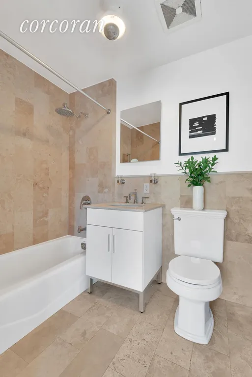 New York City Real Estate | View 42 Tiffany Place, 4A | Two marble bathrooms! | View 7