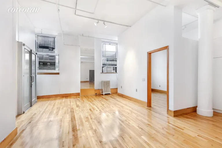 New York City Real Estate | View 565 Broadway, 6 | Entrance to Bedroom and ensuite modern Bath | View 4