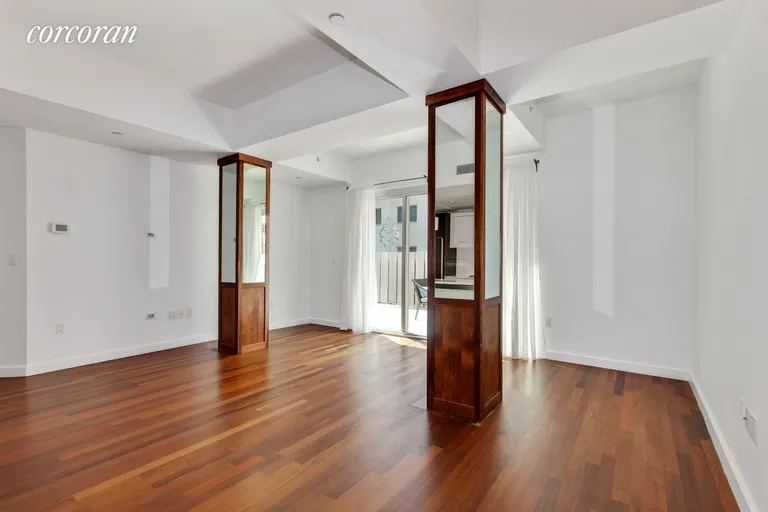 New York City Real Estate | View 125 North 10th Street, NGD | Spacious living room opens seamlessly to outdoors | View 2