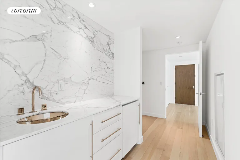 New York City Real Estate | View 135 West 52nd Street, PH3 | Primary Bedroom Wet bar | View 8