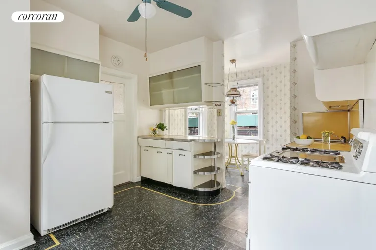 New York City Real Estate | View 7302 Ridge Boulevard | Retro eat-in-kitchen with 1/2 bath in the corner | View 5