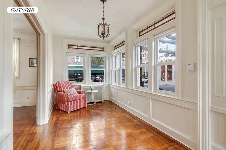 New York City Real Estate | View 7302 Ridge Boulevard | Window-filled sun porch entry | View 2