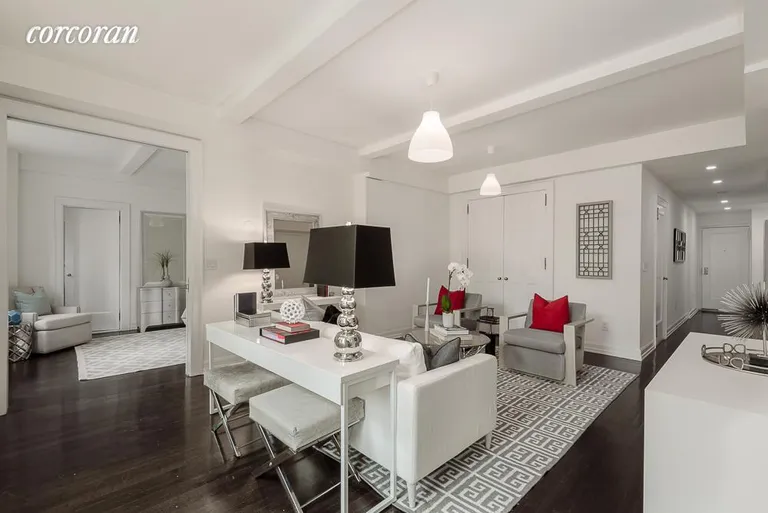 New York City Real Estate | View 157 East 72nd Street, 9HI | Living Room with Beamed Ceiling | View 3