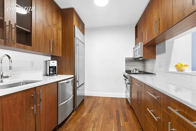 New York City Real Estate | View 88 Greenwich Street, 725 | Too many cooks in the kitchen? You'll fit!  | View 2