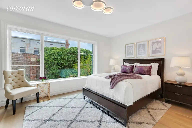New York City Real Estate | View 226A Vernon Avenue | Garden Facing Master Bedroom | View 6