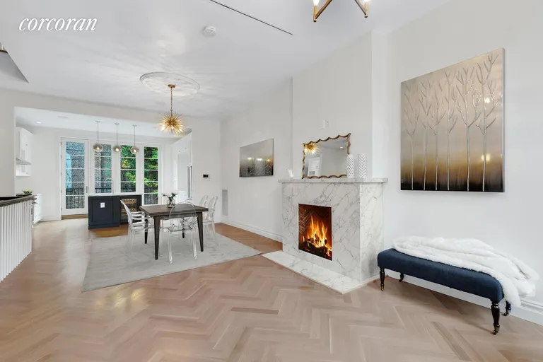 New York City Real Estate | View 226A Vernon Avenue | Open Living w/ Herringbone Detail | View 4