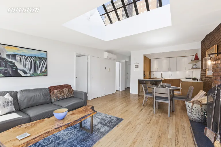 New York City Real Estate | View 356 West 23rd Street, 4B | Living Room looking towards kitchen | View 4