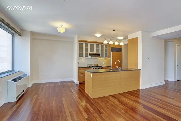 New York City Real Estate | View 30 West Street, 9F | Open Chef's Kitchen and Dining Room | View 3
