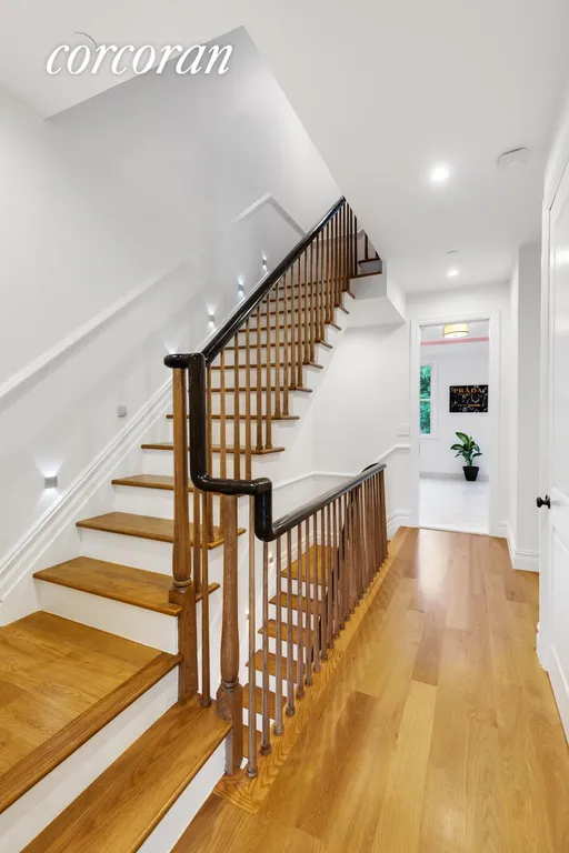 New York City Real Estate | View 381 Gates Avenue | Custom Walnut Bannister's w/ Stair Light Detail | View 11