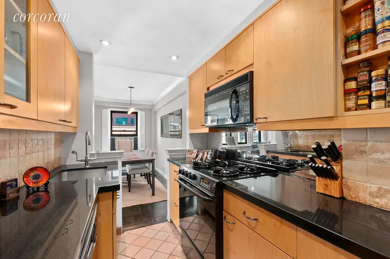 New York City Real Estate | View 54 West 16th Street, 7E | Open galley kitchen with  easy dining room access | View 7