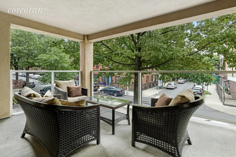 New York City Real Estate | View 317 16th Street, 2C | Spacious covered terrace for outdoor living room | View 2