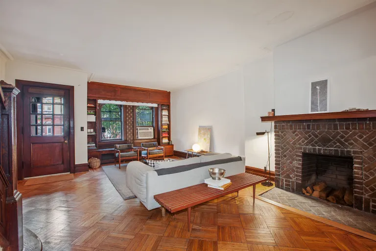 New York City Real Estate | View 30 Chester Court | Sun filled living room w/ decorative fireplace | View 2