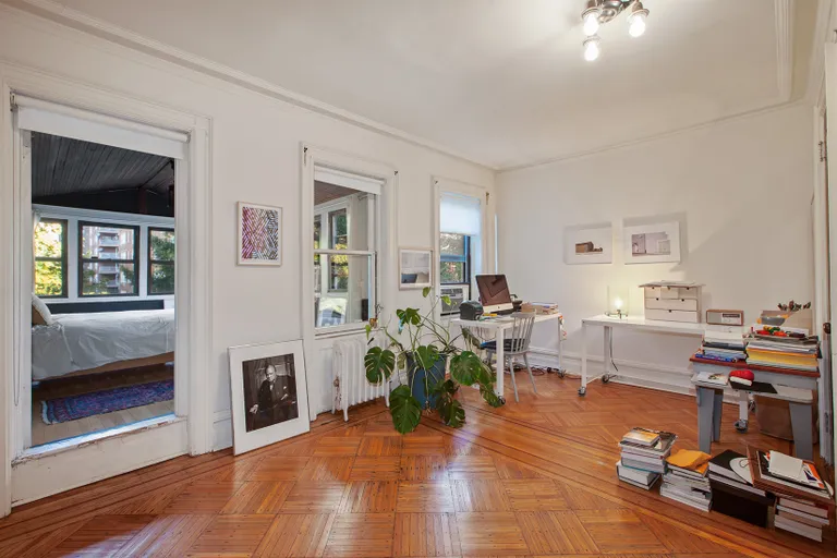 New York City Real Estate | View 30 Chester Court | Large bedroom opens to the enclosed sunroom | View 6