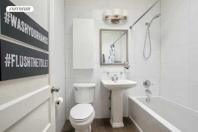 New York City Real Estate | View 525 77th Street | Upstairs Bathroom | View 10
