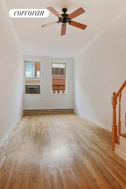 New York City Real Estate | View 23 Waverly Place, 6K | Living Area w/ High Ceilings and Unfurnished | View 3