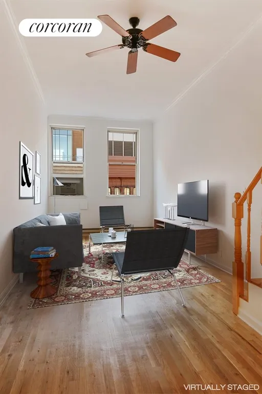 New York City Real Estate | View 23 Waverly Place, 6K | Living Room with Staging | View 2