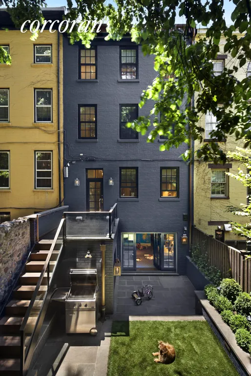 New York City Real Estate | View 69 Joralemon Street | Rear view with slate backyard and terrace | View 24