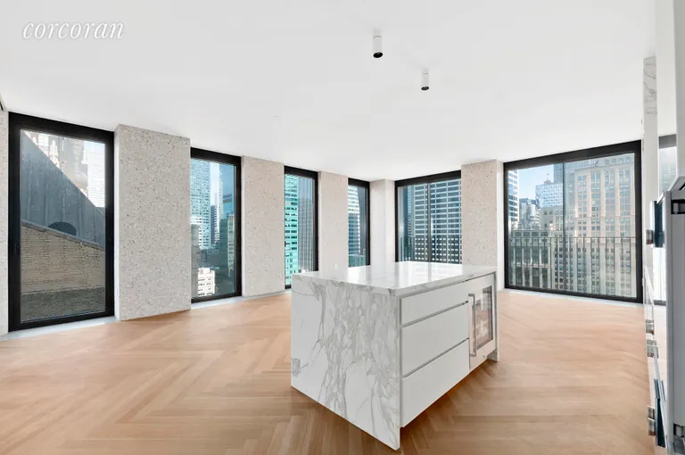 New York City Real Estate | View 16 West 40th Street, 23A | Beautiful Floor to Ceiling Windows Throughout | View 3