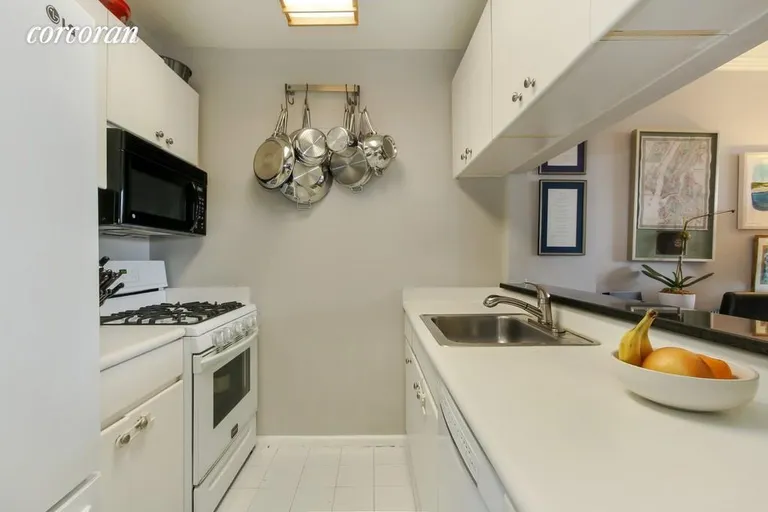 New York City Real Estate | View 130 West 79th Street, 9F | Open kitchen with new appliances | View 2