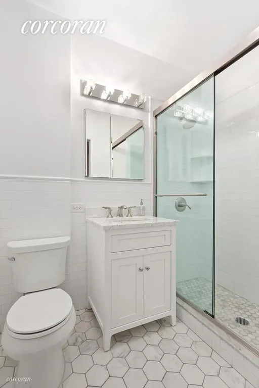 New York City Real Estate | View 250 Riverside Drive, 1 | Master bath en-suite with shower stall | View 5