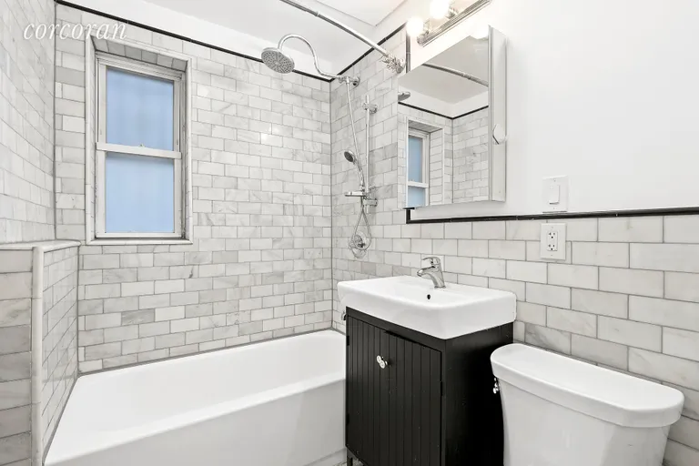 New York City Real Estate | View 333 Covert Street, 1 | Windowed bathroom with full size tub/shower! | View 6