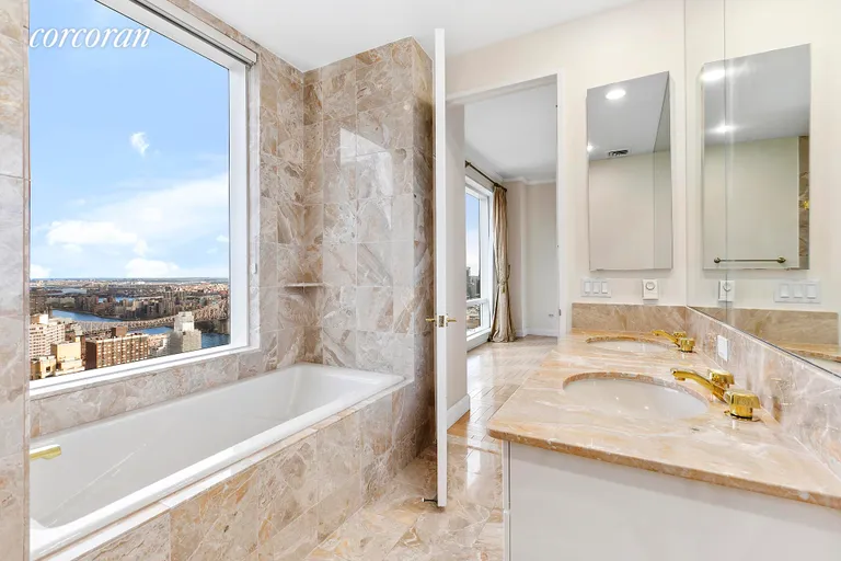 New York City Real Estate | View 845 United Nations Plaza, 53E | Master Bathroom | View 9