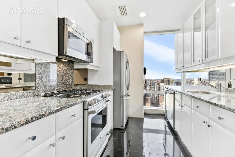 New York City Real Estate | View 845 United Nations Plaza, 53E | Kitchen w/West View | View 7