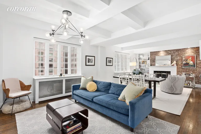 New York City Real Estate | View 170 East 78th Street, 10B | 28'8" x 13'8" living/dining room has prewar charm | View 4