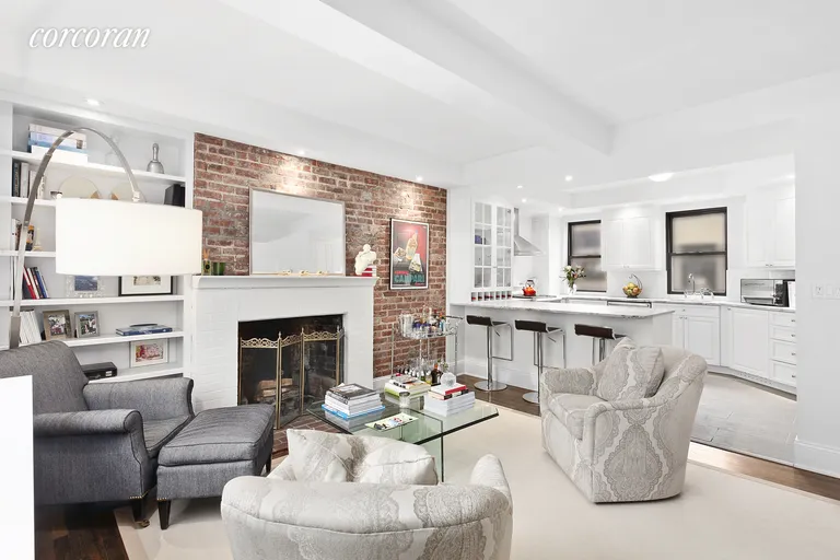 New York City Real Estate | View 170 East 78th Street, 10B | the warmth of a WBF and an exposed brick wall | View 2