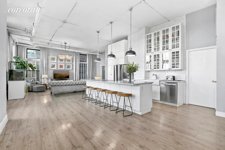 New York City Real Estate | View 875 West 181st Street, RSD | Downtown-style loft cloaked in natural light | View 2
