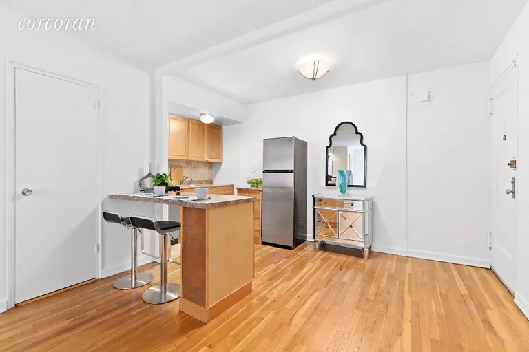 New York City Real Estate | View 54 East 8th Street, 5I | Eat in Kitchen with Breakfast Bar | View 5