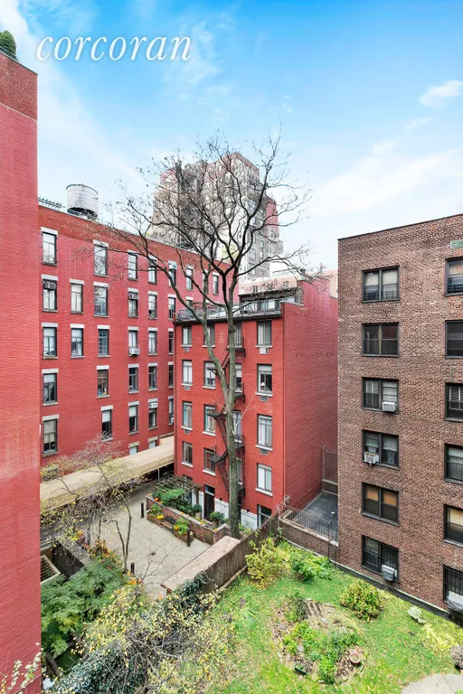 New York City Real Estate | View 54 East 8th Street, 5I | Quiet Garden View With Water Tower! | View 2