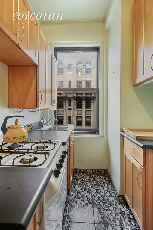 New York City Real Estate | View 599 West End Avenue, 11B | Windowed Kitchen overlooking 89th Street | View 3