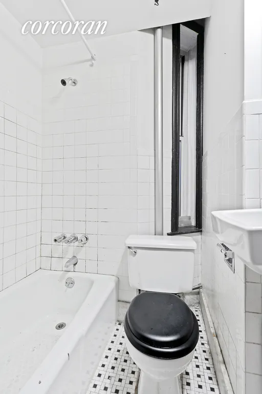 New York City Real Estate | View 225 East 4th Street, 1 | Windowed Bathroom | View 6