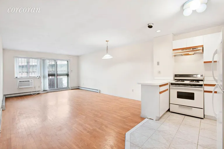 New York City Real Estate | View 2761 Bath Avenue, 2B | Living / dining / balcony | View 3