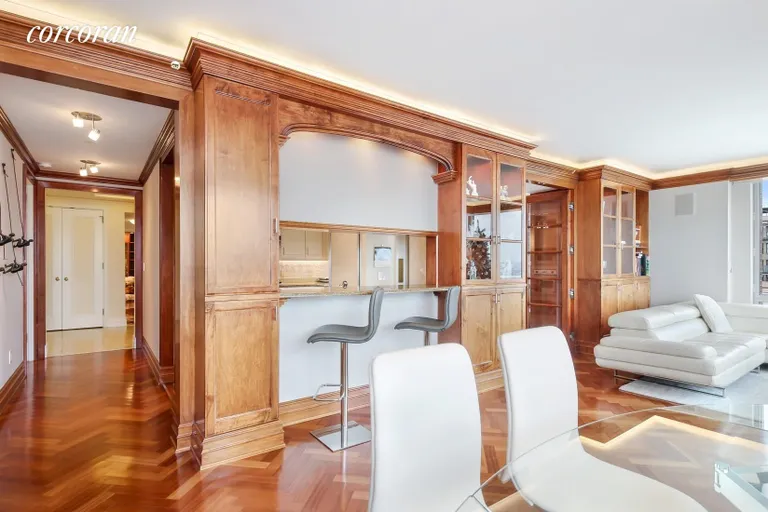 New York City Real Estate | View 10 West Street, 27E | Kitchen / Dining Rm w/ Custom Mill Work | View 5