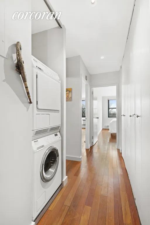 New York City Real Estate | View 379 West Street, 4B | Hallway/Washer-Dryer
 | View 4